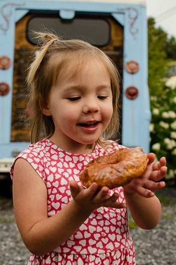 Charlotte eats Hole Doughnuts