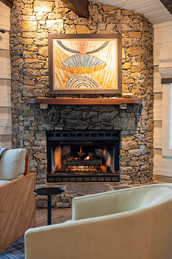 Cataloochee Ranch Inside Cabin fireplace Image by NC Tripping