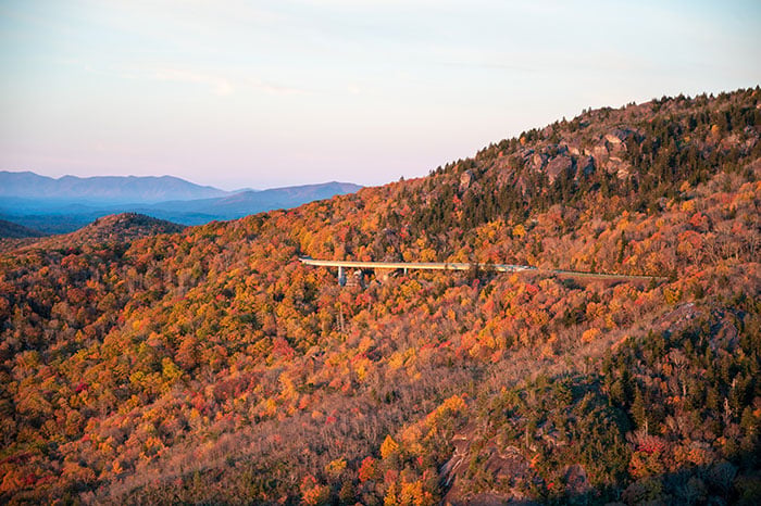 This Image shows a view of Linn Cove Viaduct from Rough Ridge during Fall in North Carolina.